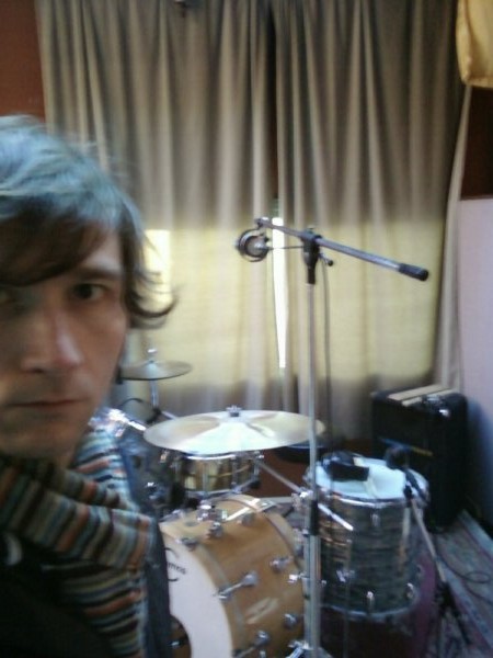 Dean with mic'ed drums in the studio